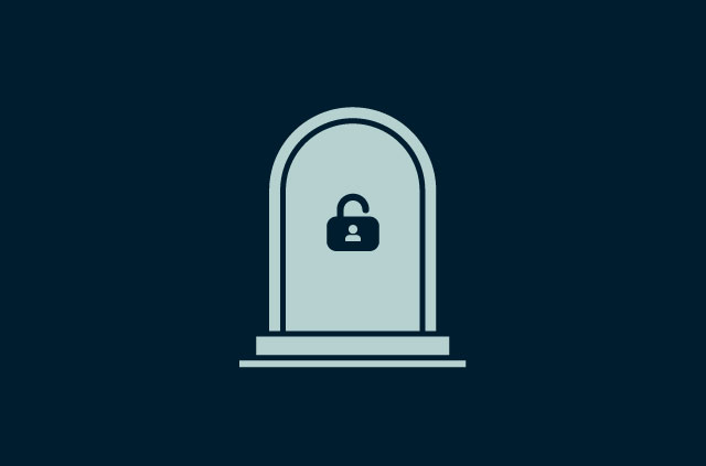 Tombstone with a padlock on it.