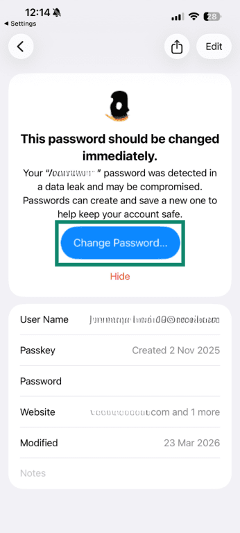 iPhone Passwords app showing data leak warning with “Change Password” button highlighted.