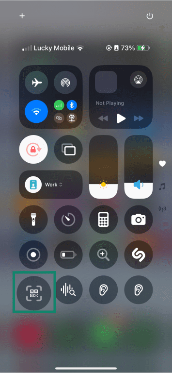 An iPhone screenshot, showing the QR code scanner button in the Control Center.