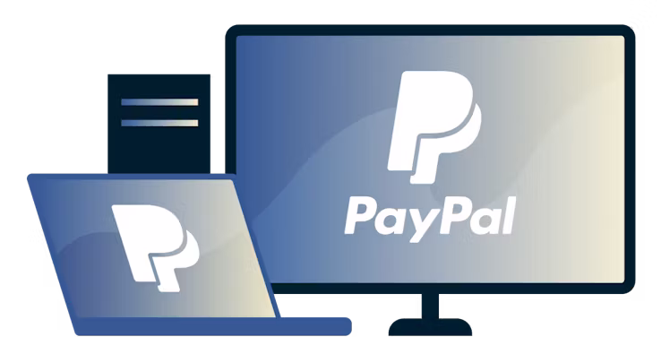 PayPalのロゴが入ったデスクトップとノートパソコン。
