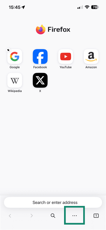 The Home Screen of Firefox iOS with the menu button highlighted.